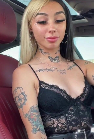 Hot Cruella Morgan in Black Top in a Car