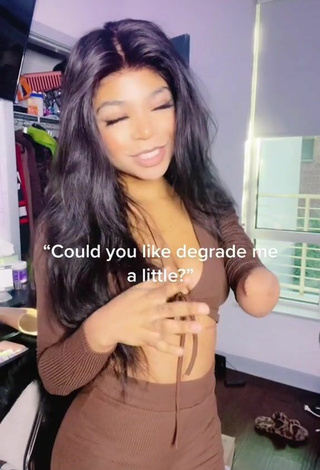 Sexy Destinee Faire Shows Cleavage in Brown Crop Top
