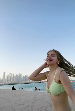 5. Hot Elisa Shows Cleavage in Light Green Bikini at the Beach
