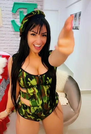 4. Sexy Emanuelly Raquel Shows Cleavage in Camouflage Swimsuit and Bouncing Boobs