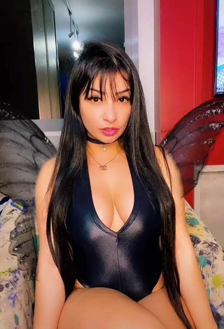 2. Sweetie Emanuelly Raquel Shows Cleavage in Black Bodysuit
