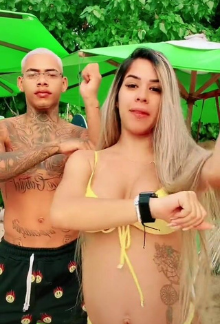 4. Erotic Andressita Chegou Shows Cleavage in Yellow Bikini and Bouncing Boobs