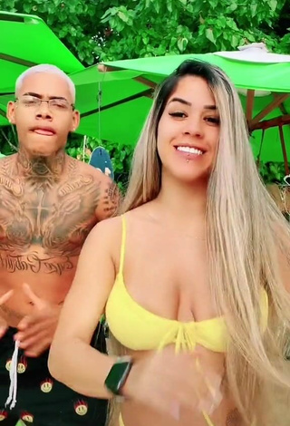 6. Erotic Andressita Chegou Shows Cleavage in Yellow Bikini and Bouncing Boobs
