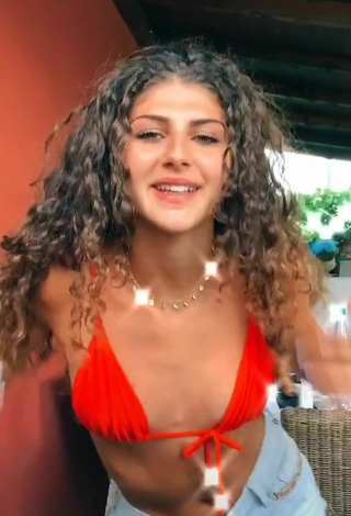 2. Sexy Ginevra Giaccherini in Electric Orange Bikini Top