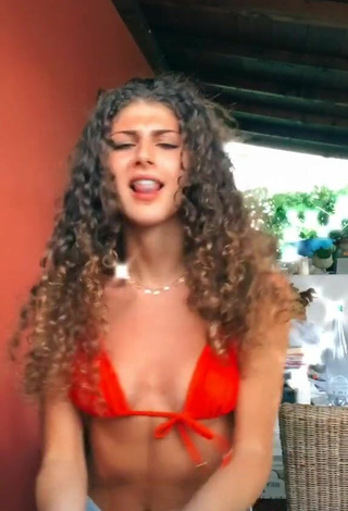 5. Sexy Ginevra Giaccherini in Electric Orange Bikini Top