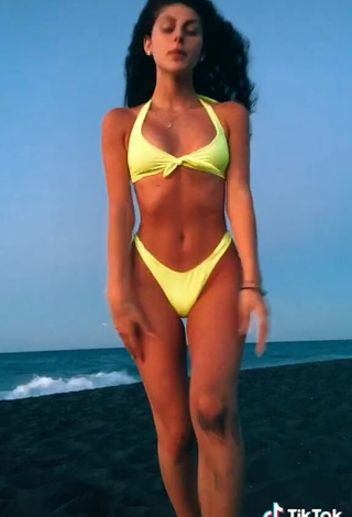 5. Sweet Ginevra Giaccherini Shows Cleavage in Cute Yellow Bikini at the Beach