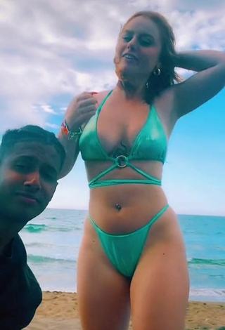 6. Cute Giorgia Cavalluzzo Shows Cleavage in Green Bikini at the Beach