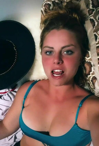 5. Cute Giorgia Cavalluzzo Shows Cleavage in Turquoise Bikini Top