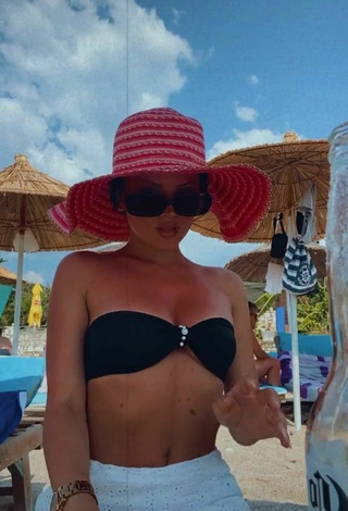 6. Hot Grisela Shows Cleavage in Black Bikini Top at the Beach