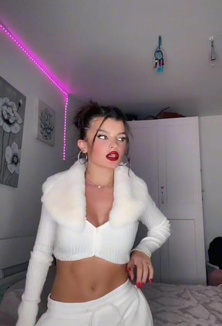 2. Sweetie Grisela Shows Cleavage in White Crop Top
