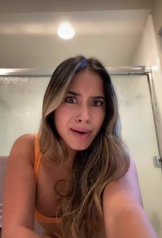 Hot Jasmin Acosta Shows Cleavage in Orange Bikini