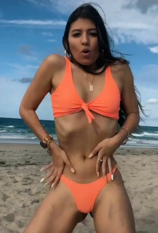 6. Breathtaking Jesca Jimenez in Orange Bikini at the Beach
