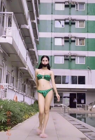 4. Hot Jing Alvarez Shows Cleavage in Green Bikini in a Street