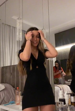 2. Sexy Julia Alves Shows Cleavage in Black Dress