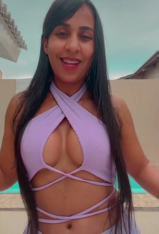Sexy Karollyny Campos Shows Cleavage in Purple Crop Top