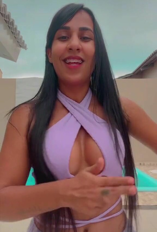 2. Sexy Karollyny Campos Shows Cleavage in Purple Crop Top