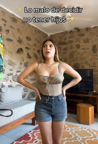 Sexy Katia Nabil Shows Cleavage in Olive Crop Top