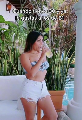 6. Sexy Katia Nabil in Striped Bikini Top