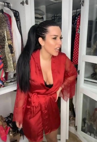 5. Sexy Laura Lempika Shows Cleavage in Red Bathrobe
