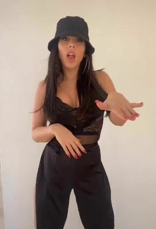 2. Sexy Laura Lempika Shows Cleavage in Black Top
