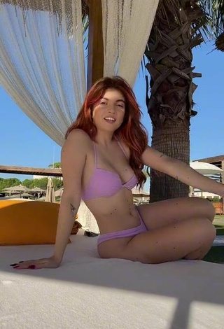 Sexy Lorena Visan Shows Cleavage in Purple Bikini