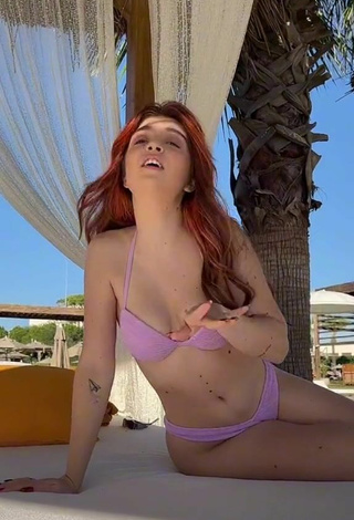 6. Sexy Lorena Visan Shows Cleavage in Purple Bikini