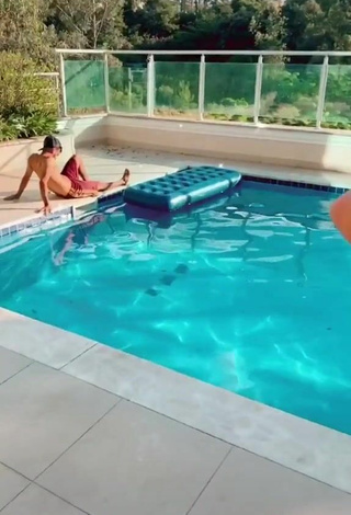 3. Sensual Luana Targinno Shows Cleavage in Black Bikini at the Pool