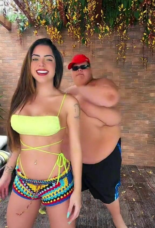 3. Hottie Luana Targinno Shows Cleavage in Yellow Bikini Top