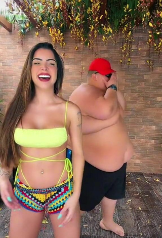 4. Hottie Luana Targinno Shows Cleavage in Yellow Bikini Top