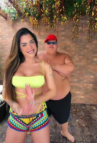 5. Hottie Luana Targinno Shows Cleavage in Yellow Bikini Top