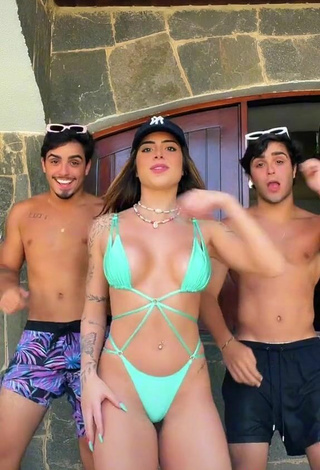 3. Hot Luana Targinno Shows Cleavage in Green Bikini