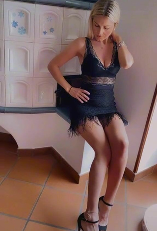 Sexy Nadejda Sendrea Shows Cleavage in Black Dress