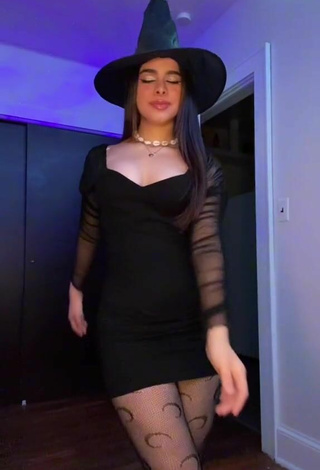 3. Sexy Naomi in Black Dress