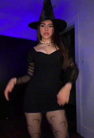 4. Sexy Naomi in Black Dress