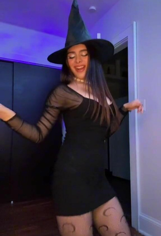 5. Sexy Naomi in Black Dress