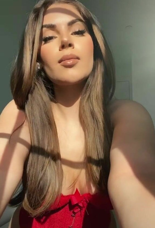 2. Sexy Nazanin Kavari Shows Cleavage in Red Corset