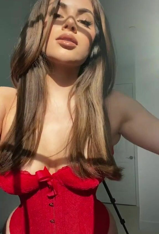 6. Sexy Nazanin Kavari Shows Cleavage in Red Corset
