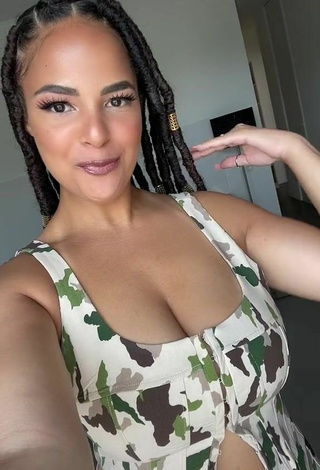 Sexy peachy.mely Shows Cleavage in Camouflage Crop Top