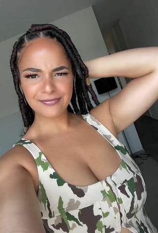 3. Sexy peachy.mely Shows Cleavage in Camouflage Crop Top