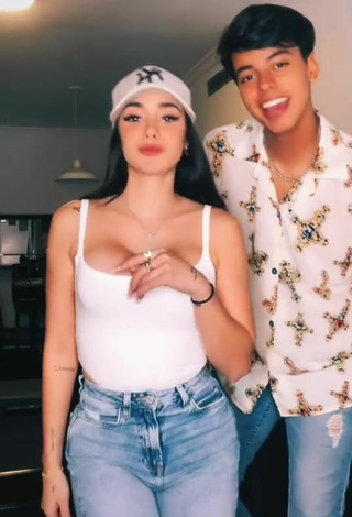 4. Sexy Poleth Villalba Shows Cleavage in White Top
