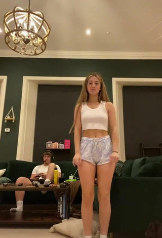 3. Sexy Poppy Mead in White Crop Top