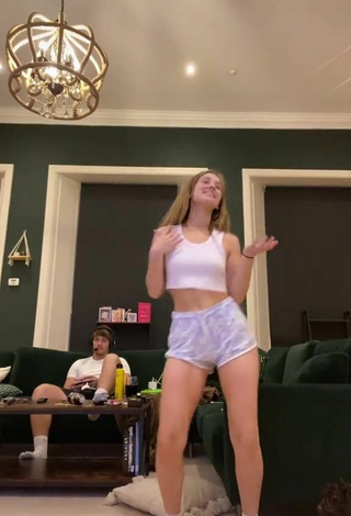 5. Sexy Poppy Mead in White Crop Top