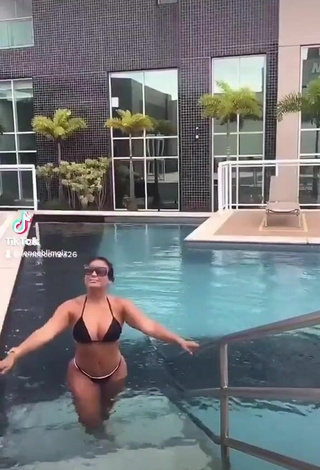 Renee Blimgiz Shows Cleavage in Erotic Black Bikini at the Pool