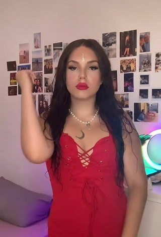 6. Sexy Selena Milán in Red Dress