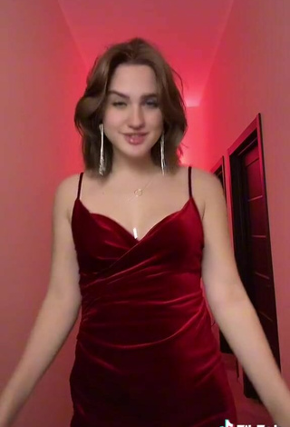 4. Sexy Lilia Shows Cleavage in Red Dress