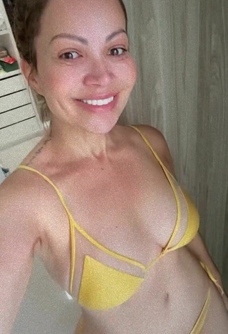 1. Hot Solange Almeida Shows Cleavage in Yellow Bikini