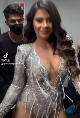 2. Sexy Thamara Gómez Shows Cleavage in Silver Bodysuit