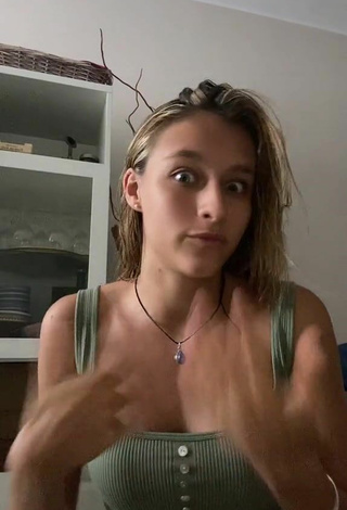 2. Sexy Virgitsch Shows Cleavage in Olive Tank Top