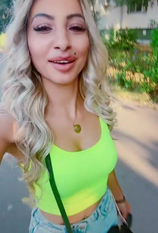 Beautiful Adriana Ciriblan Shows Cleavage in Sexy Lime Green Crop Top in a Street