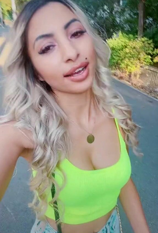 4. Sweetie Adriana Ciriblan Shows Cleavage in Lime Green Crop Top